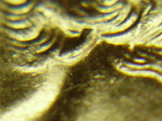 2005-Doubled-Ear-On-W,-VA-State-Quarter